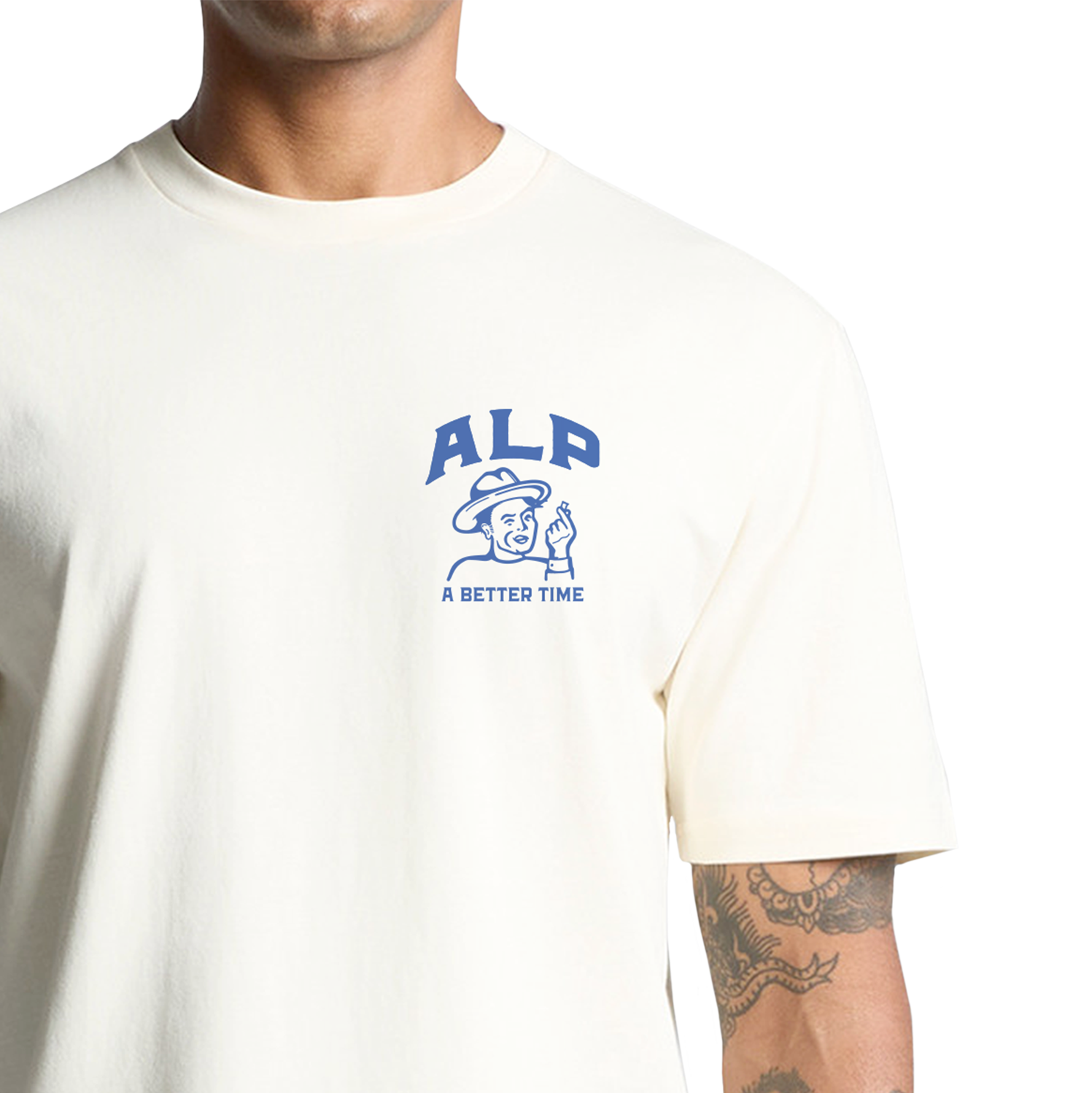 Man wearing an off-white T-shirt featuring the ALP logo and slogan "A Better Time," promoting nicotine pouches.