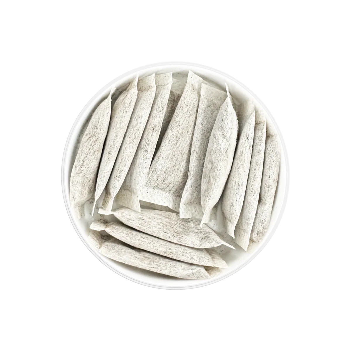Non-tobacco nicotine pouches neatly arranged in a white circular container viewed from above.