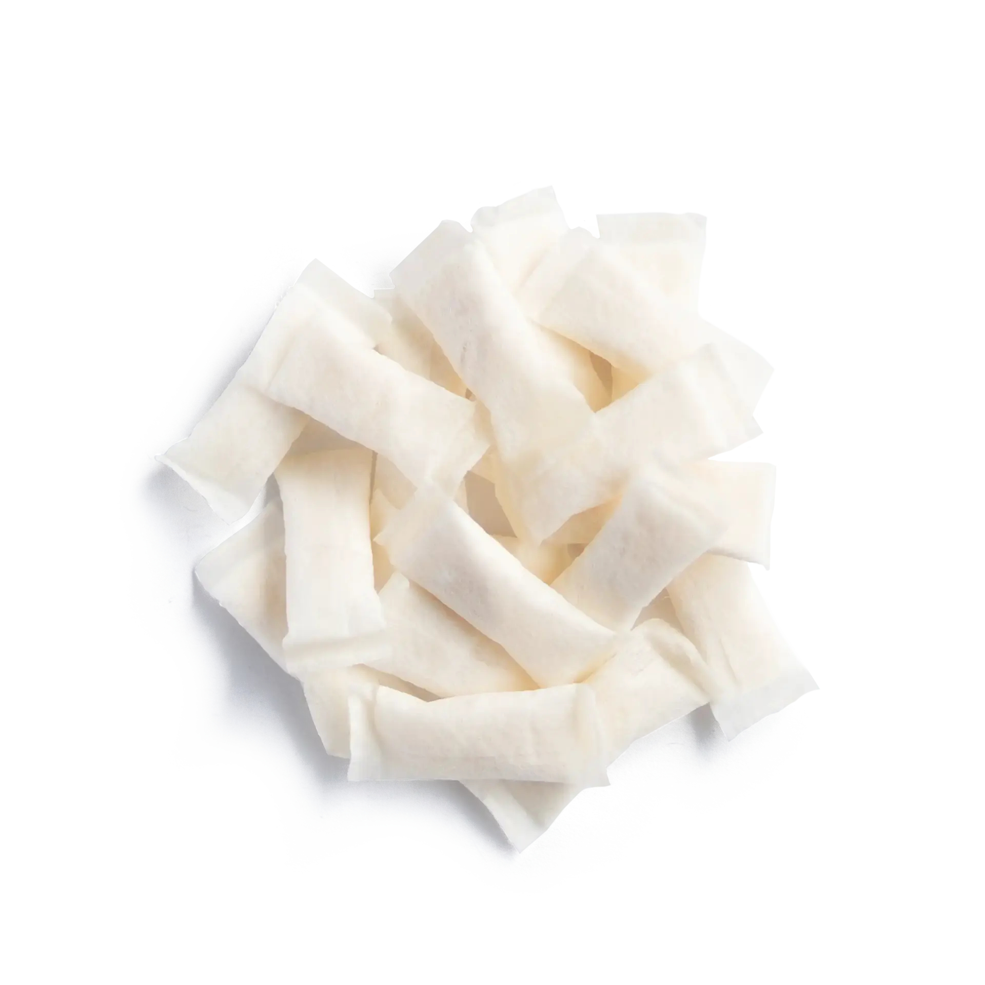 Oral nicotine pouches in a white pile, showcasing clean, uniform pouches with a soft texture and rectangular shape.